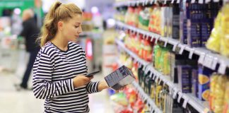 Woman Reading Product Label