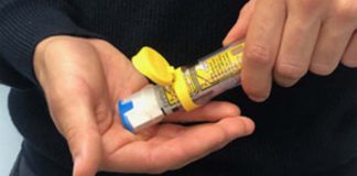 Epipen sticks to carrier tube