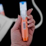 Auto-Injector with Purse