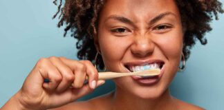 Woman Brushing Teeth