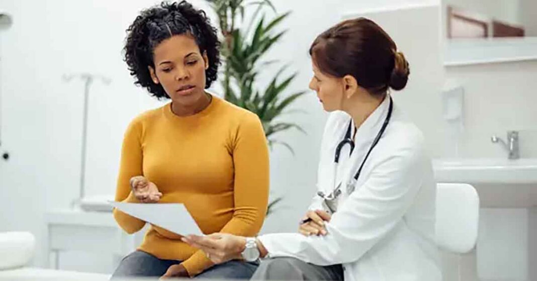 Doctor Talking to Adult Patient
