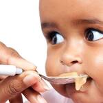 Baby Eating Solid Food