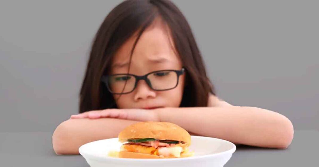 Girl Stressed Over Food