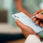 Doctor Writing Prescription