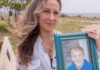 Georgina Cornago Holding Photo of Son Giovanni Cipriano