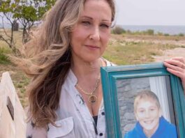 Georgina Cornago Holding Photo of Son Giovanni Cipriano