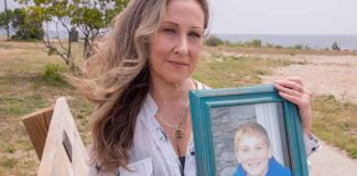 Georgina Cornago Holding Photo of Son Giovanni Cipriano