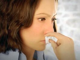 Woman using neffy epinephrine nasal spray