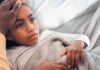 Alpha-Gal Syndrome in Kids: Why the “Red Meat Allergy” Often Hides in Plain Sight Girl in Bed with Tummy Ache